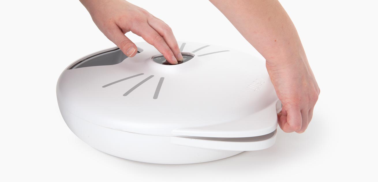 Place fingers on nose-shaped LCD display to open the 6-meal Feeder