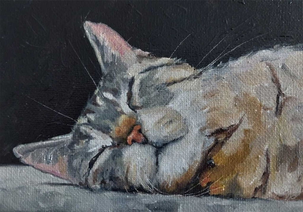 An oil painting of a tabby cat sleeping peacefully against a dark background