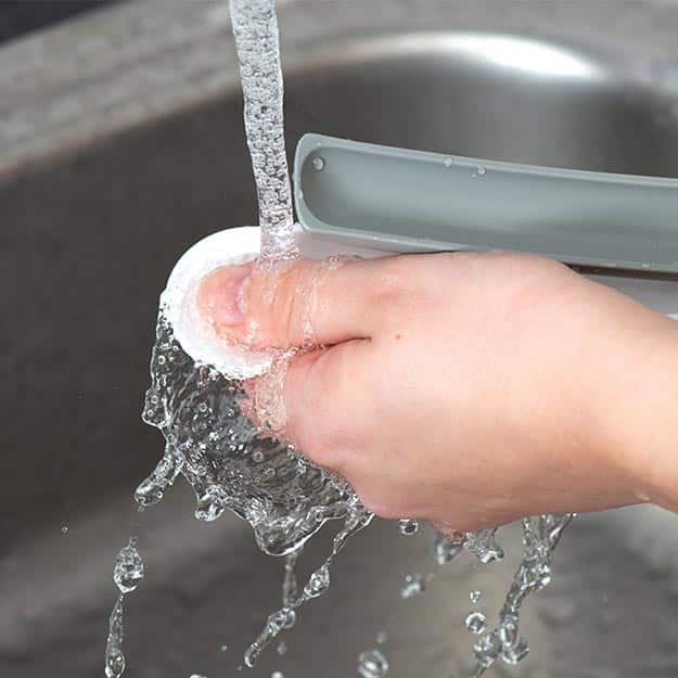 Creamy Spoon Cleaning under water