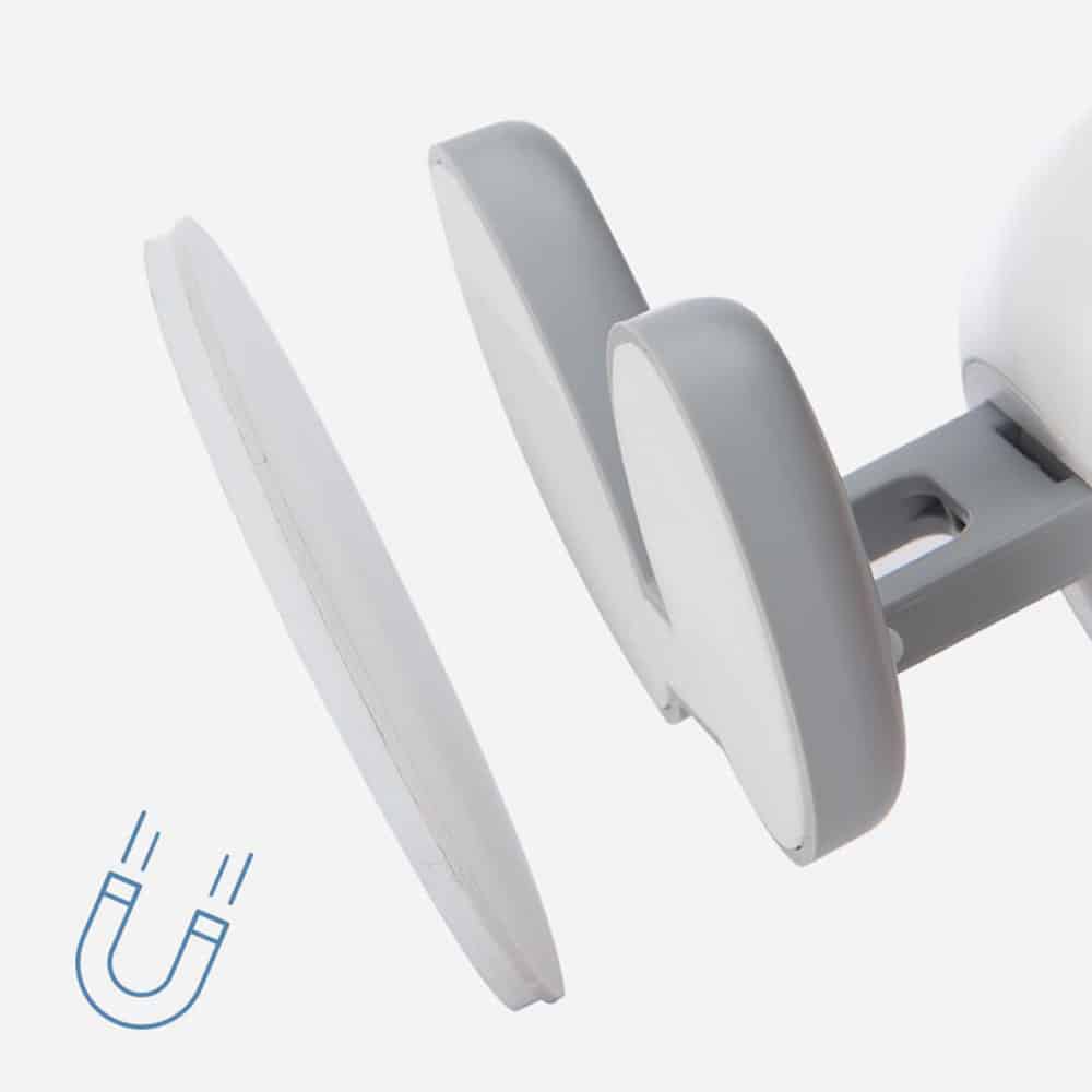 Close-up of a magnetic attachment feature on a Catit product, showing a gray component connecting to a white surface