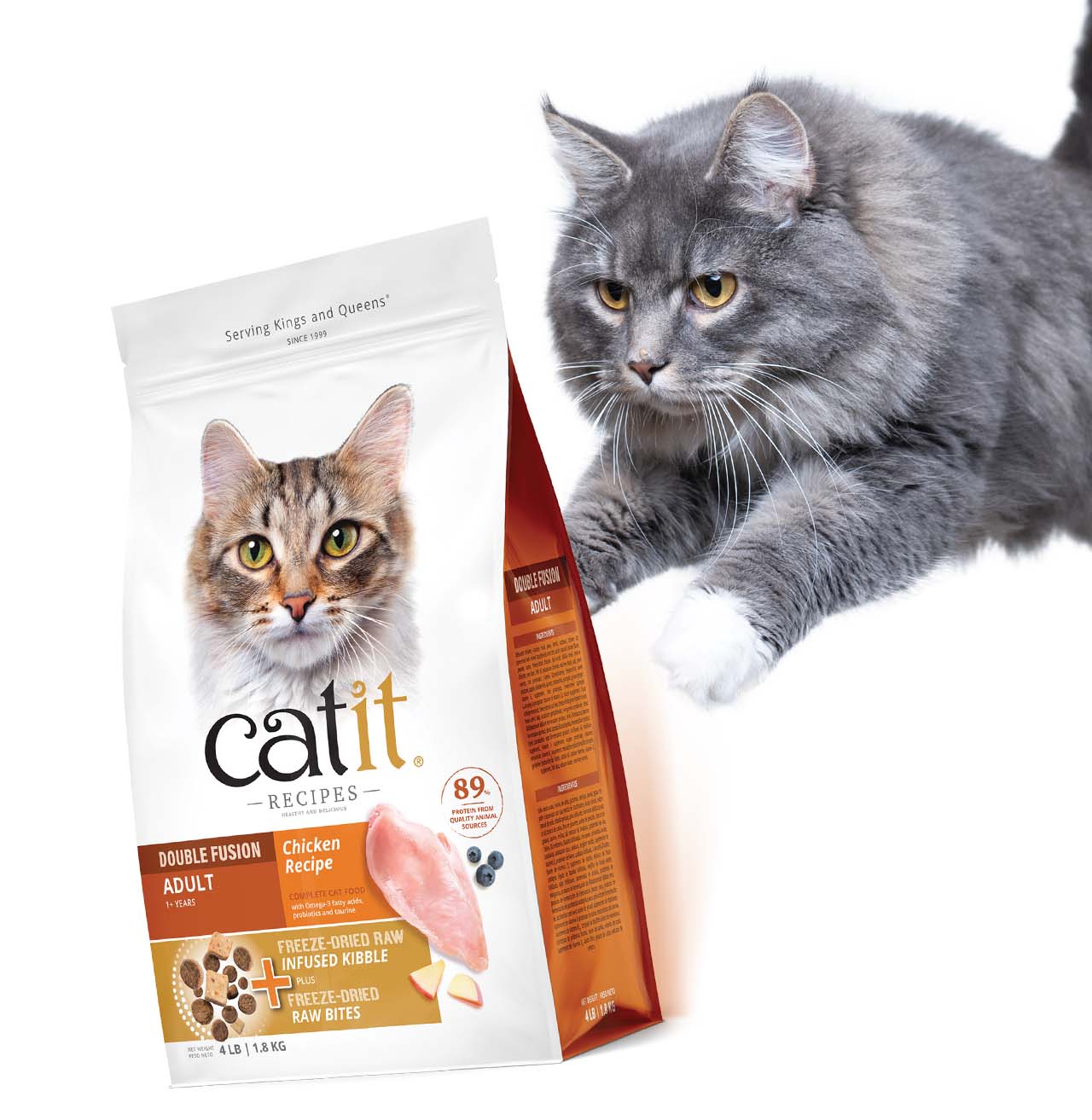 A fluffy gray cat reaching toward a bag of Catit Double Fusion Chicken Recipe adult cat food