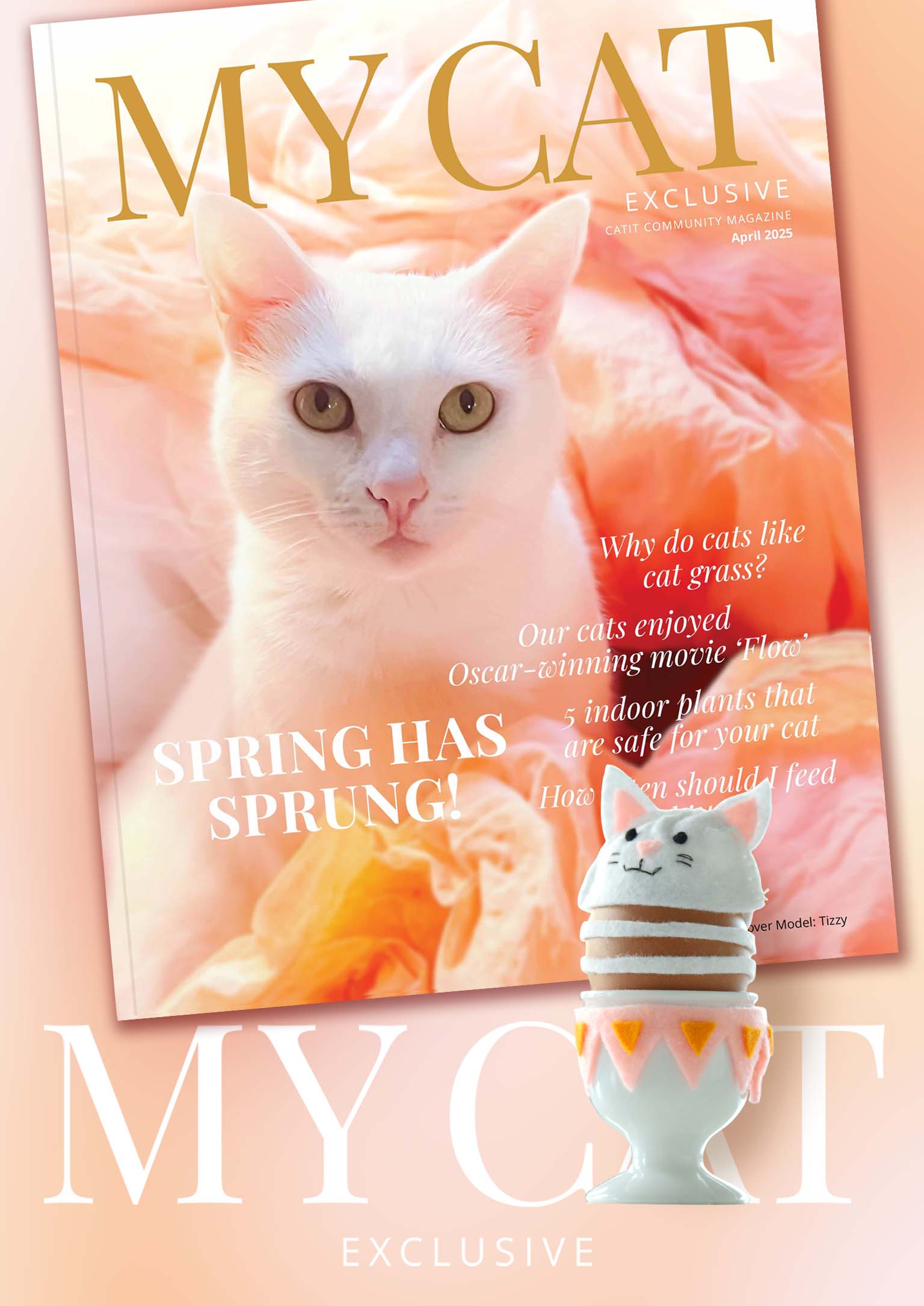 Catit My Cat magazine cover for April 2025 featuring a white cat and a cat-themed egg cup toy
