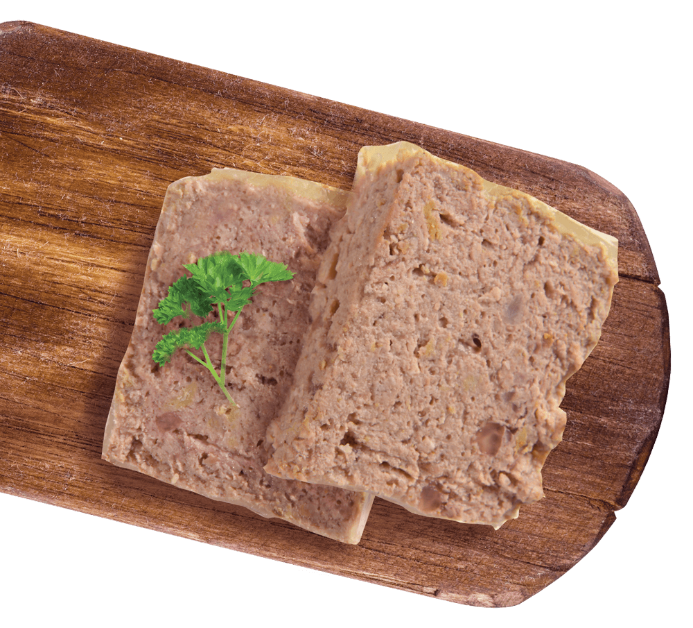 Two slices of turkey pâté topped with a sprig of parsley on a wooden cutting board
