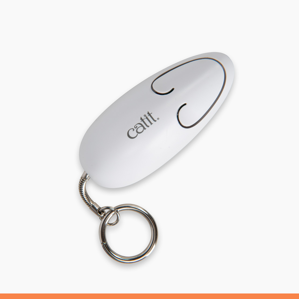 White Catit laser pointer toy with a metal keychain ring