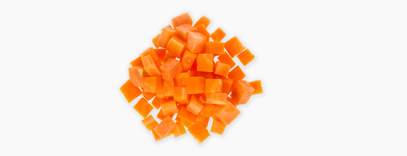 A pile of diced orange carrots on a white background