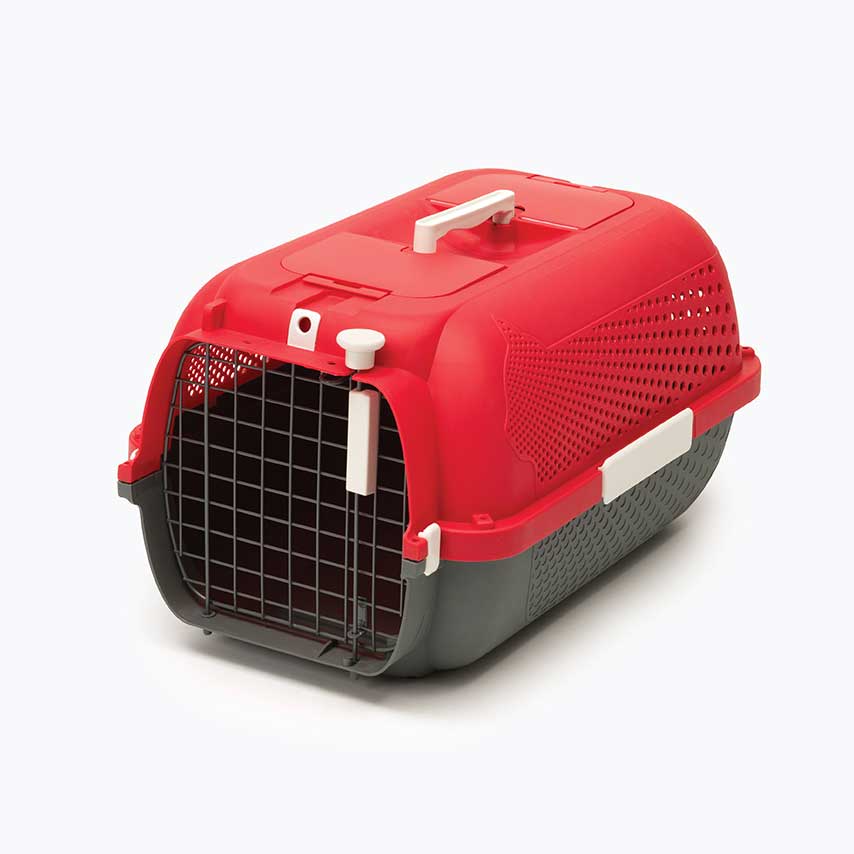 Red and grey plastic pet carrier with a wire door and top handle