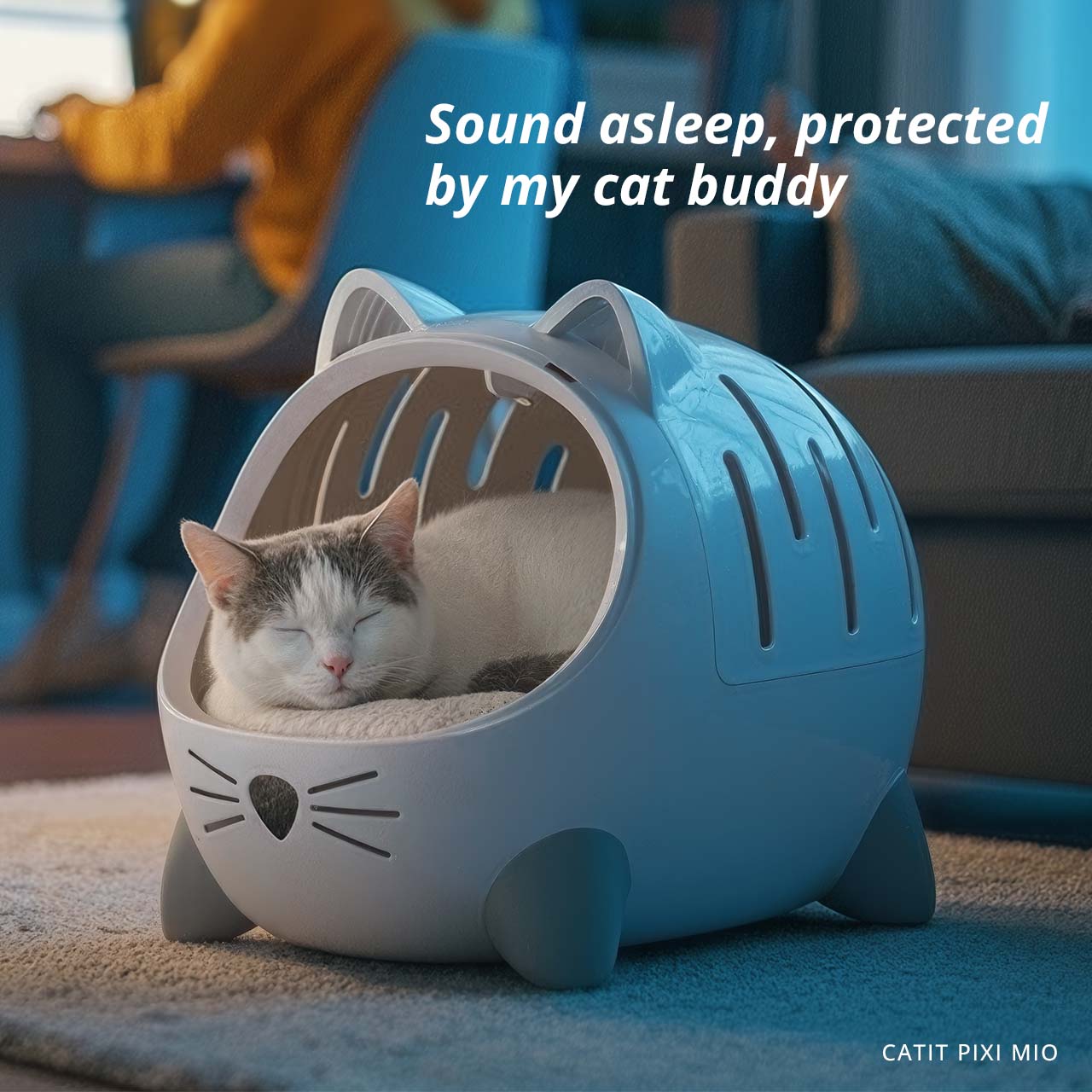 A white cat sleeping inside a cat-shaped Catit PIXI MIO bed, with the text Sound asleep, protected by my cat buddy
