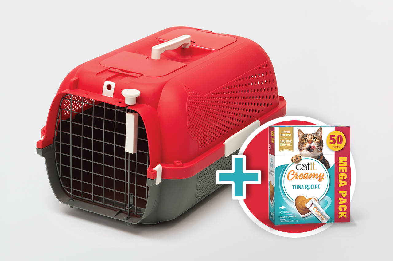A red and grey cat carrier paired with a 50-count pack of Catit Creamy tuna recipe lickable cat treats