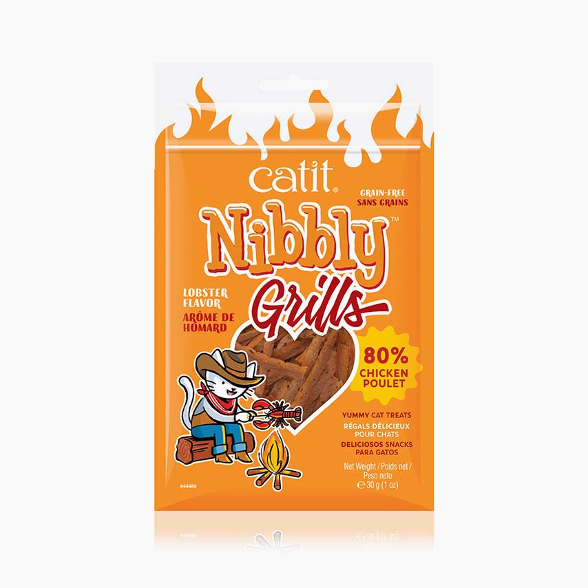 Catit Nibbly Grills lobster-flavored cat treats packaging featuring a cartoon cat grilling a lobster