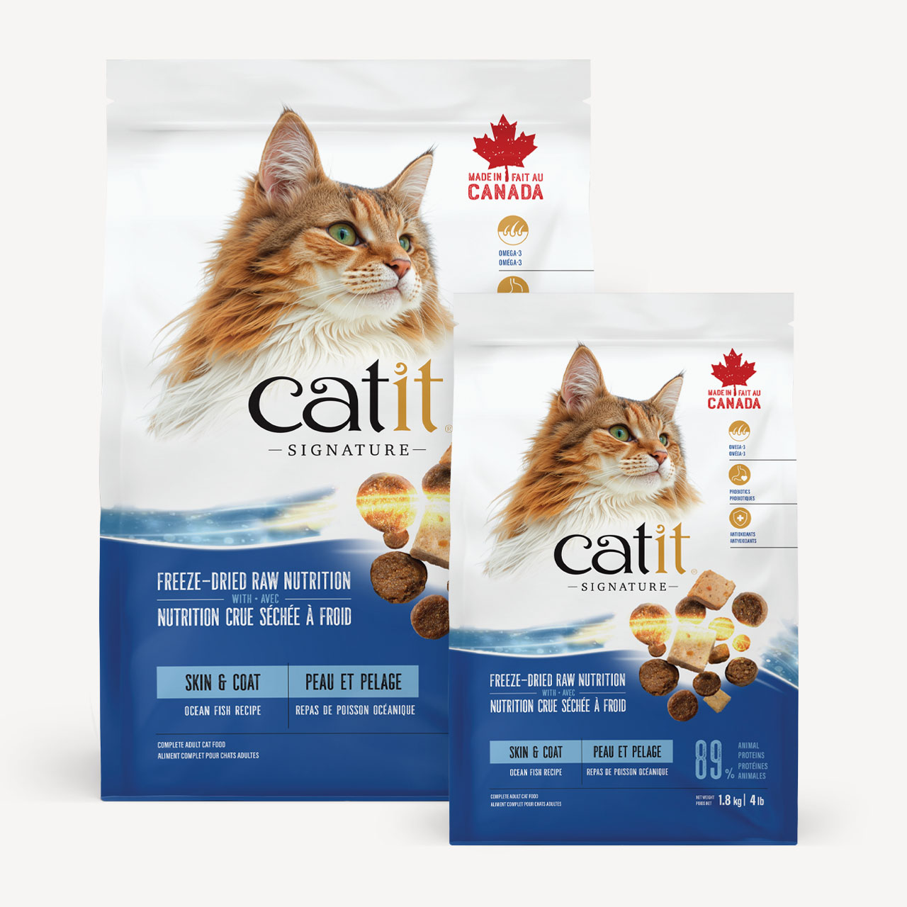 Two bags of Catit Signature Skin & Coat Ocean Fish Recipe freeze-dried raw cat food packaging