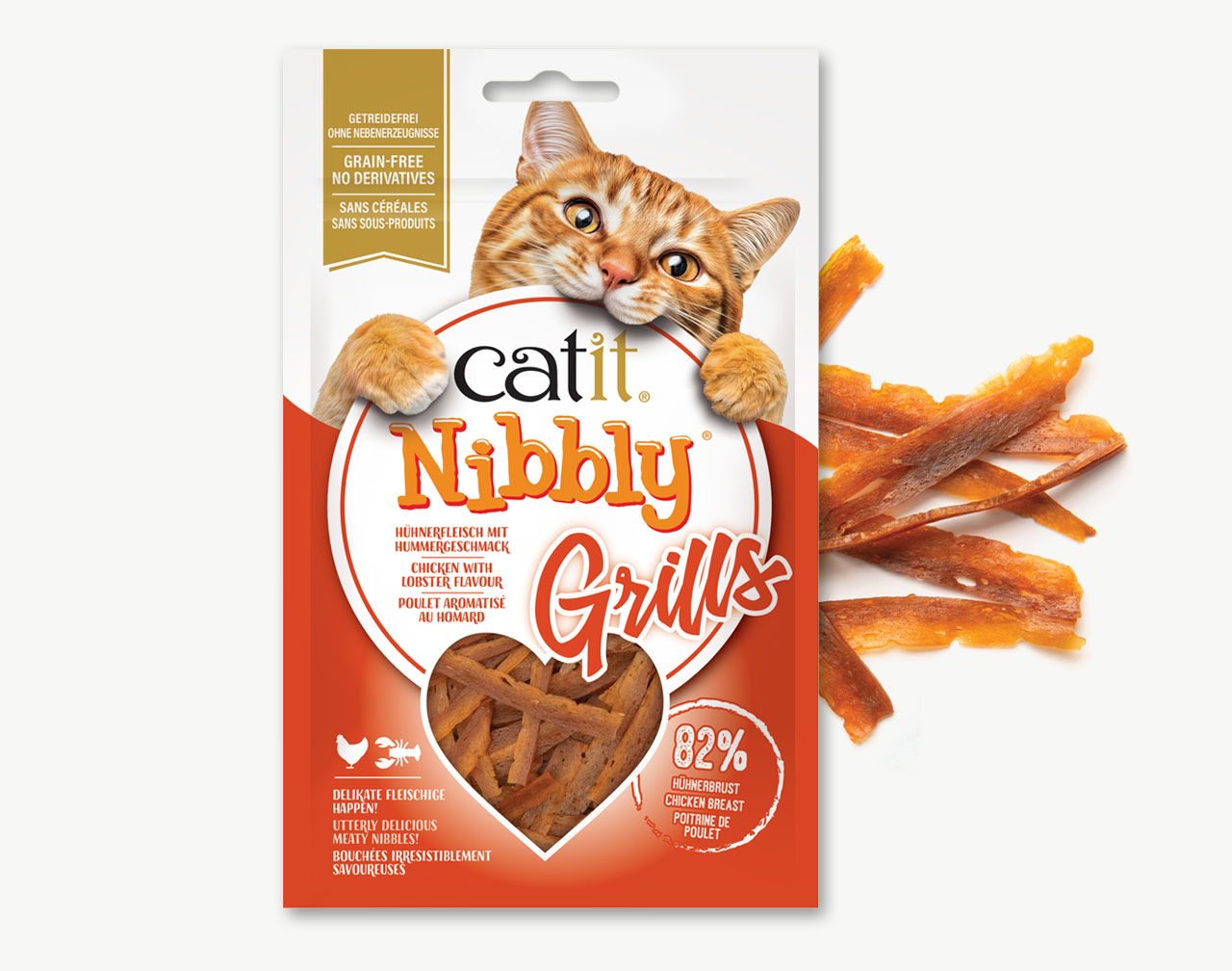 Catit Nibbly Grills chicken and lobster flavored cat treat packaging with a picture of a cat and the treats inside