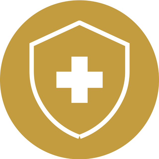 Gold circle icon featuring a white shield with a cross, representing health or medical care