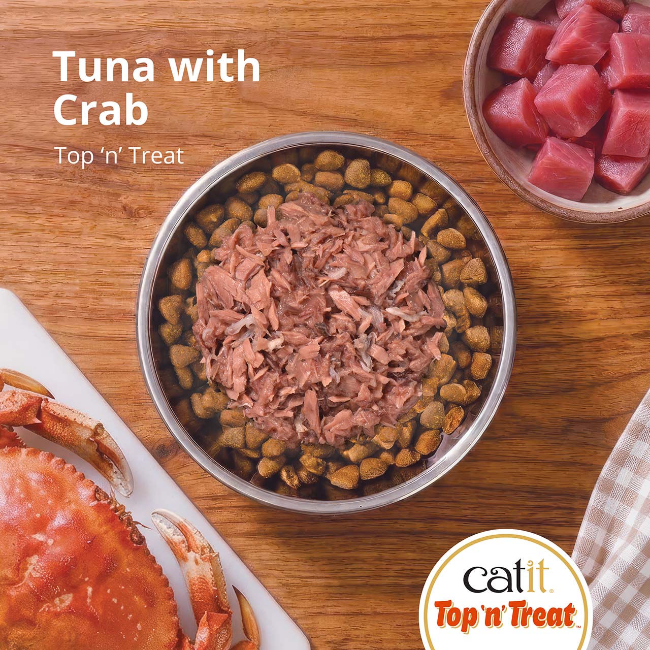 Catit Top 'n' Treat cat food featuring tuna and crab served over dry kibble in a bowl