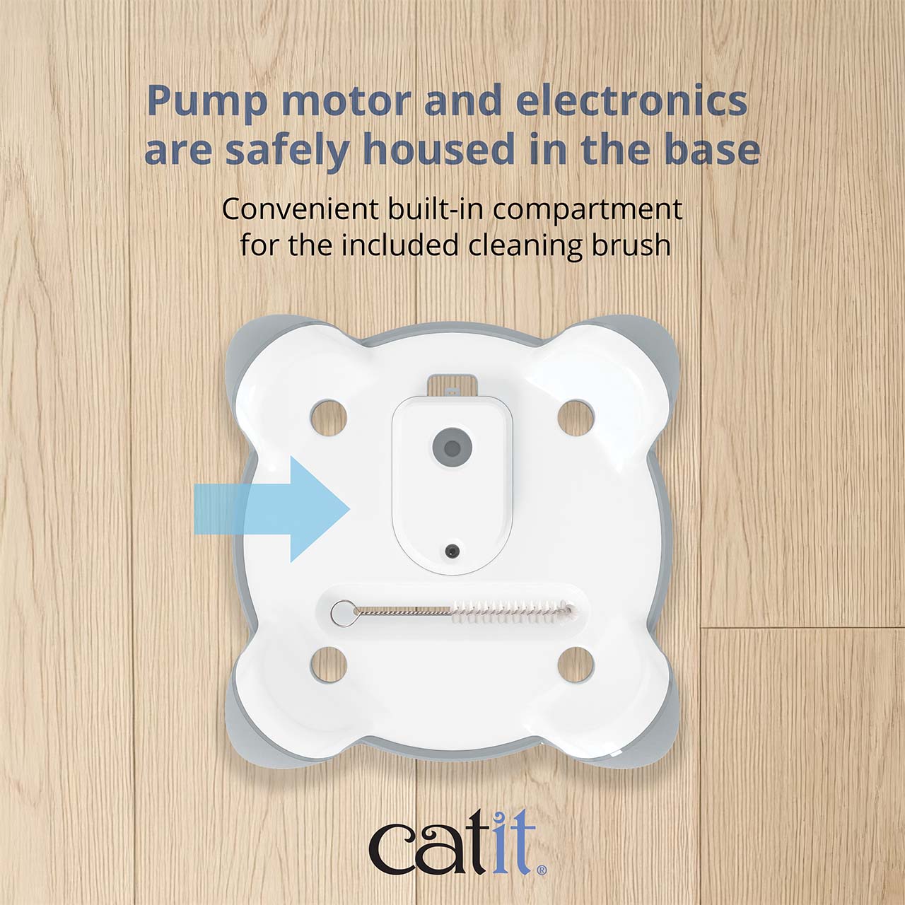 The base of a Catit PIXI fountain features a built-in compartment for storing the included cleaning brush