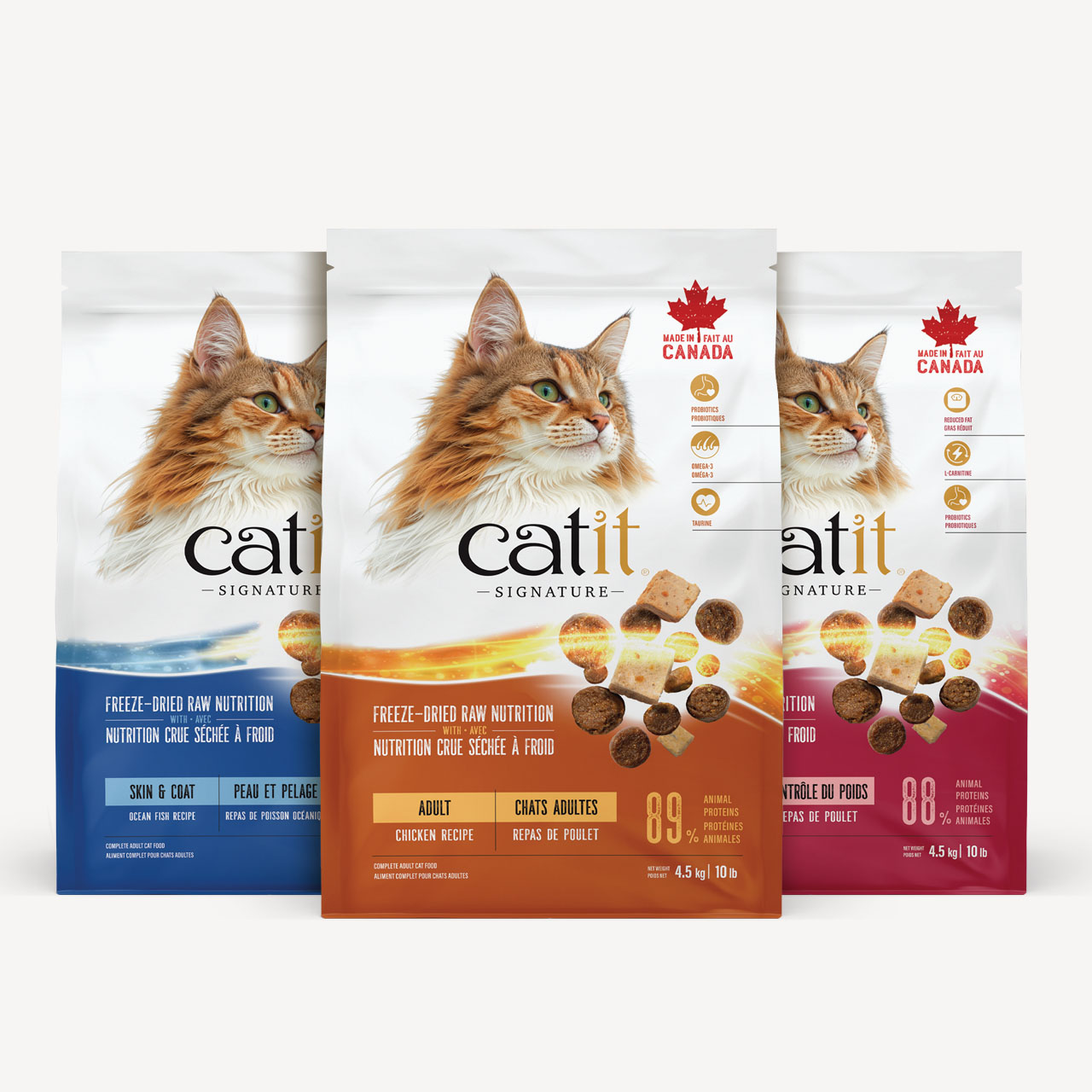 Three bags of Catit Signature freeze-dried raw cat food in Ocean Fish, Chicken, and Weight Control recipes