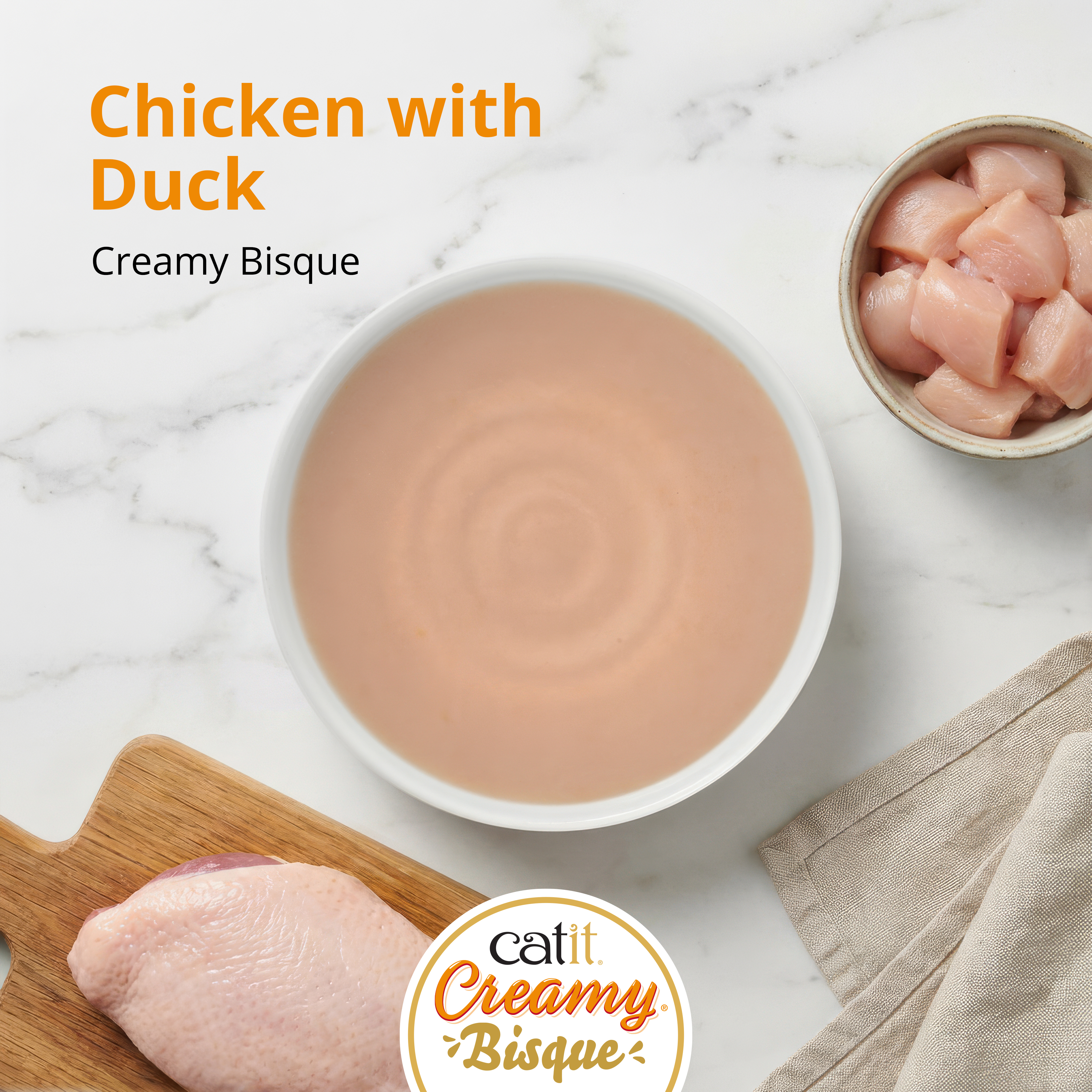 Catit Creamy Bisque cat treat in Chicken with Duck flavor, featuring a bowl of bisque, raw chicken, and duck breast