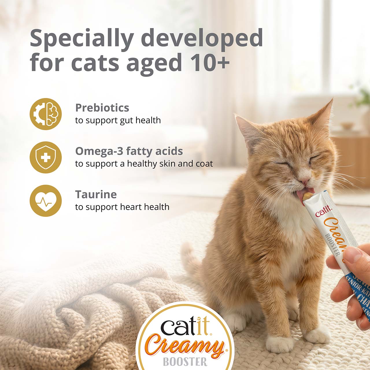 Catit Creamy Booster treat for senior cats aged 10+ with prebiotics, omega-3 fatty acids, and taurine