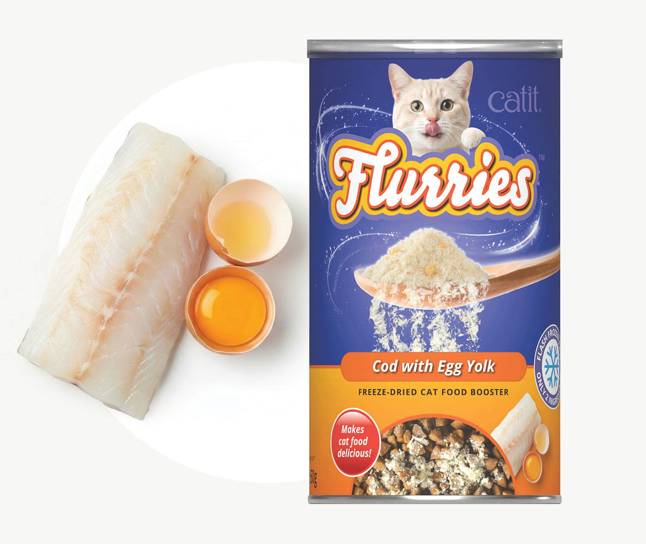 Catit Flurries freeze-dried cat food booster in Cod with Egg Yolk flavor, shown with raw fish and egg ingredients