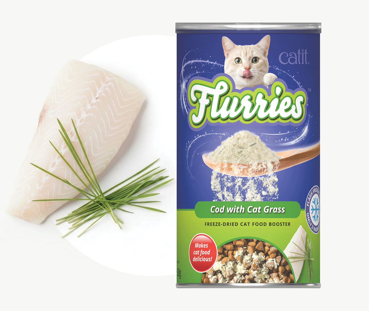 Catit Flurries freeze-dried cod and cat grass food booster packaging next to a piece of cod and cat grass
