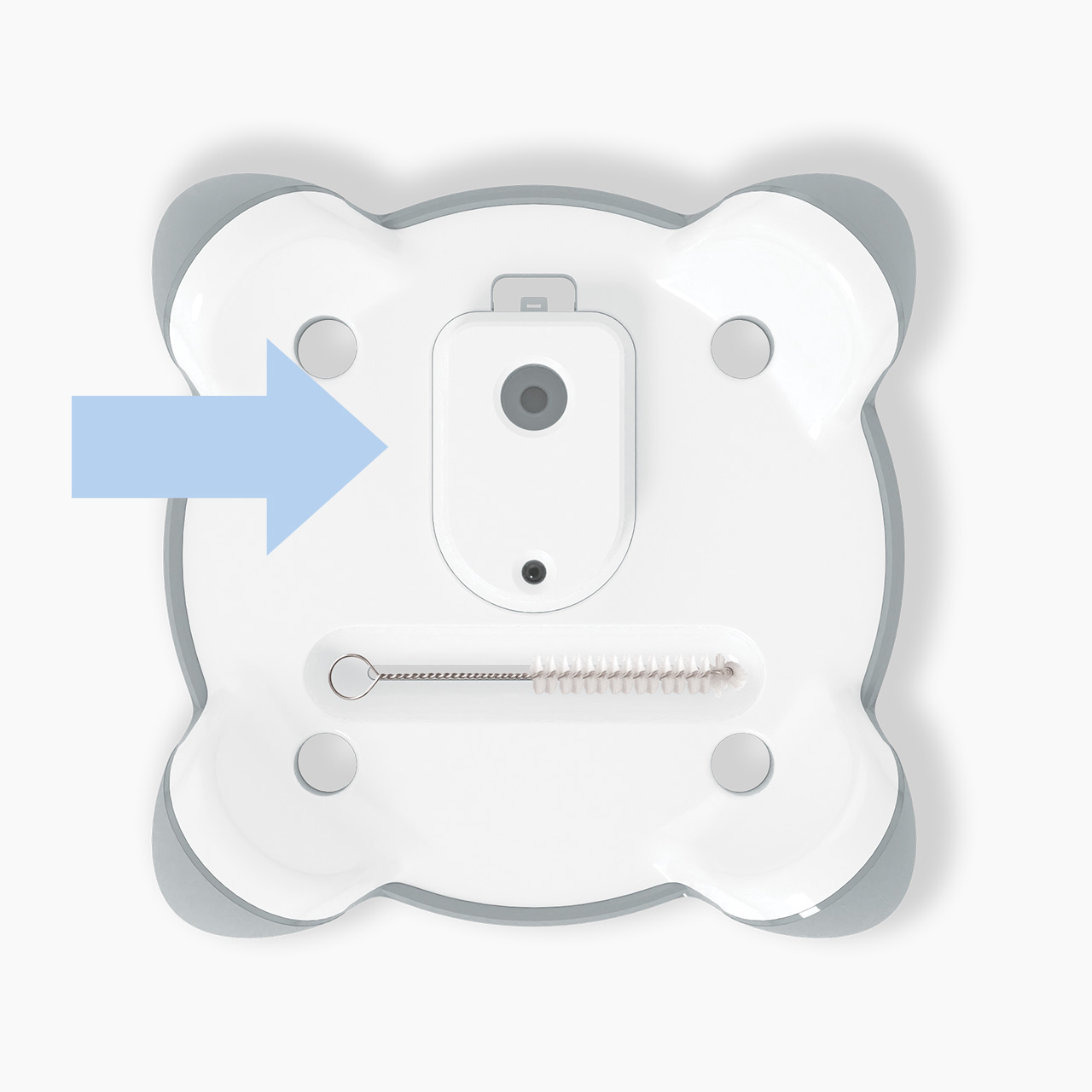 Bottom view of a white Catit PIXI fountain base with a cleaning brush and a blue arrow pointing to the pump housing