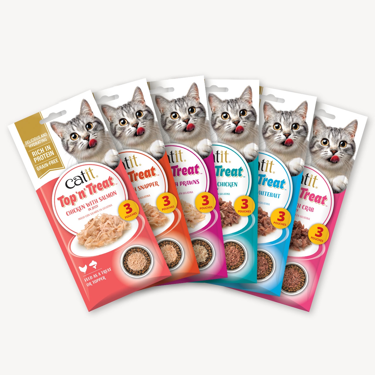 Six packages of Catit Top n Treat cat food in various flavors, each featuring a cat and three pouches of food