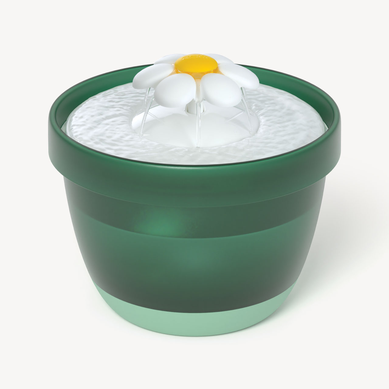 Green and light green plastic cat water fountain with a white and yellow flower-shaped spout