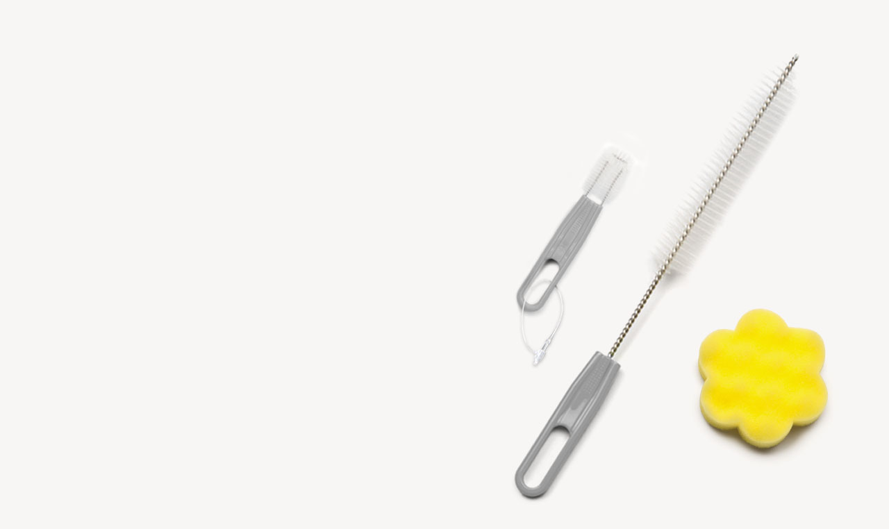 Catit fountain cleaning set including a long brush, a small brush, and a flower-shaped sponge