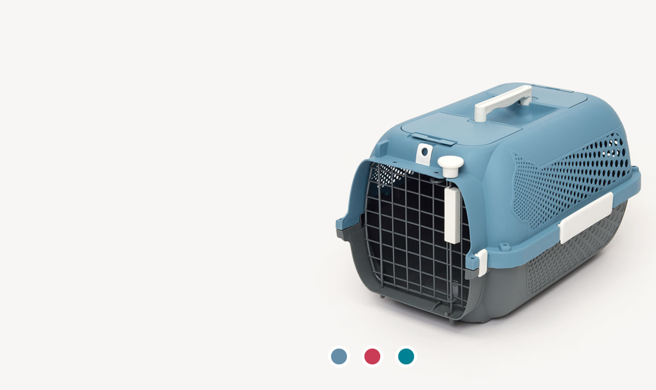 Blue and grey plastic cat carrier with a wire door and top handle, shown with three color selection dots below