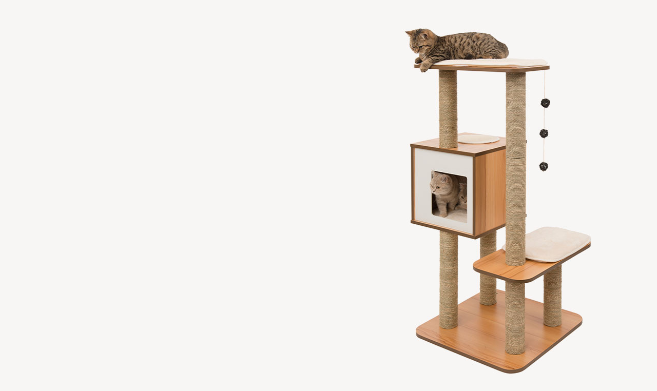 Two cats on a Vesper cat tree with a wooden frame, sisal scratching posts, and soft cushions