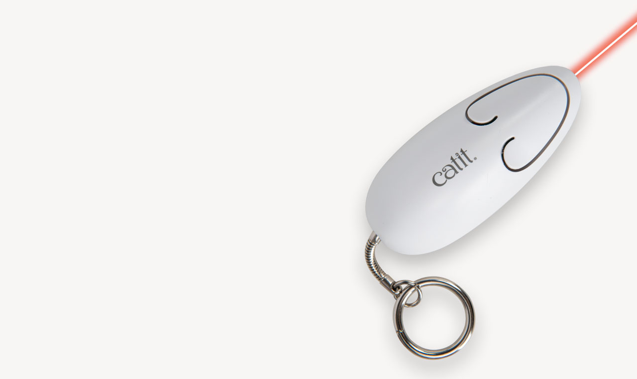 Catit white mouse-shaped laser toy with a keychain attachment emitting a red laser beam