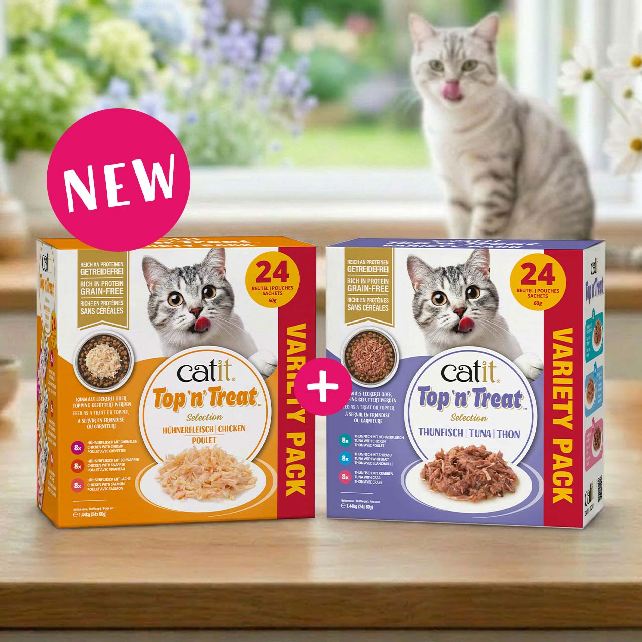 Catit Top'n'Treat variety packs standing on kitchen countertop with cat in the back