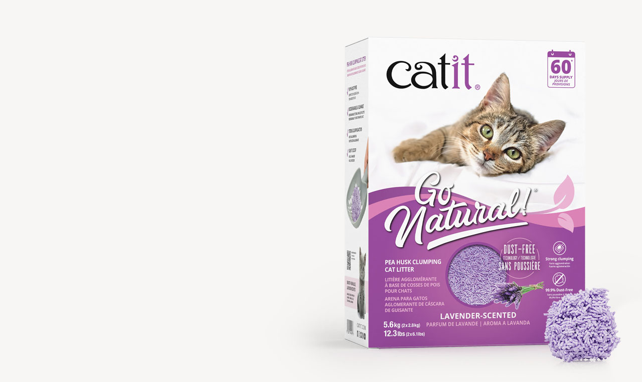 Catit Go Natural lavender-scented pea husk clumping cat litter packaging with a pile of litter in the foreground