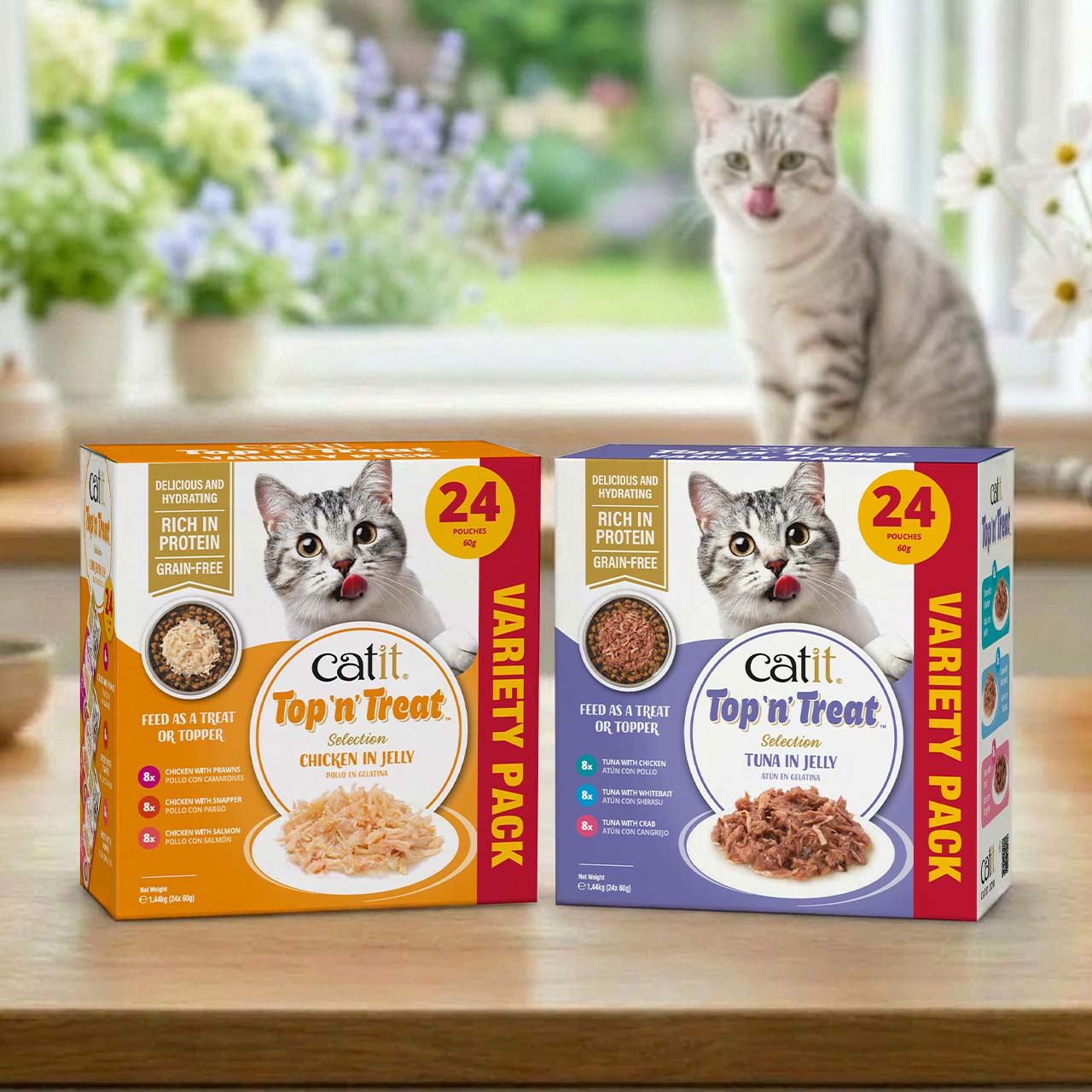 Top'n'Treat United Kingdom packagings of the multipacks standing on wooden countertop with garden and cat in the background