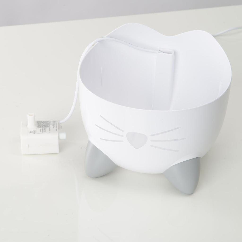 Pump lying next to PIXI Mini fountain