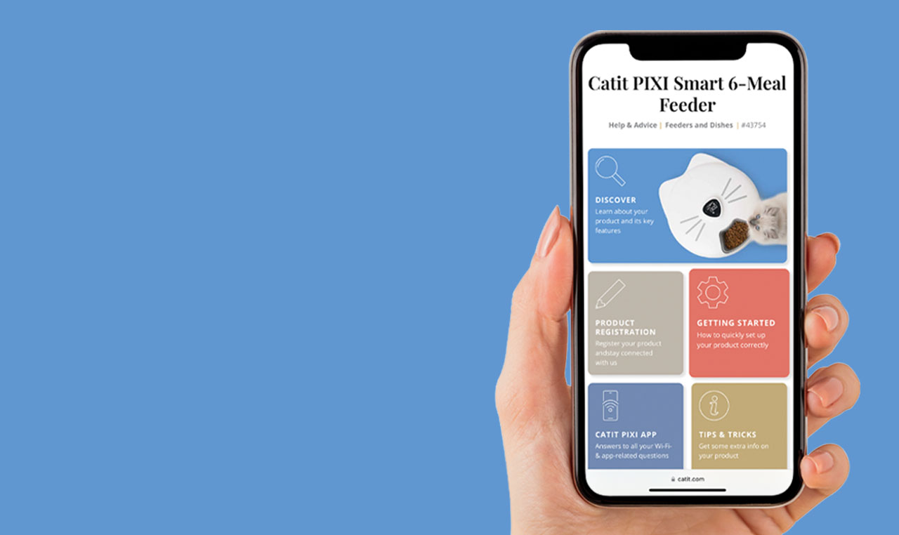Hand holding phone with PIXI Smart 6-meal feeder help & advice page open