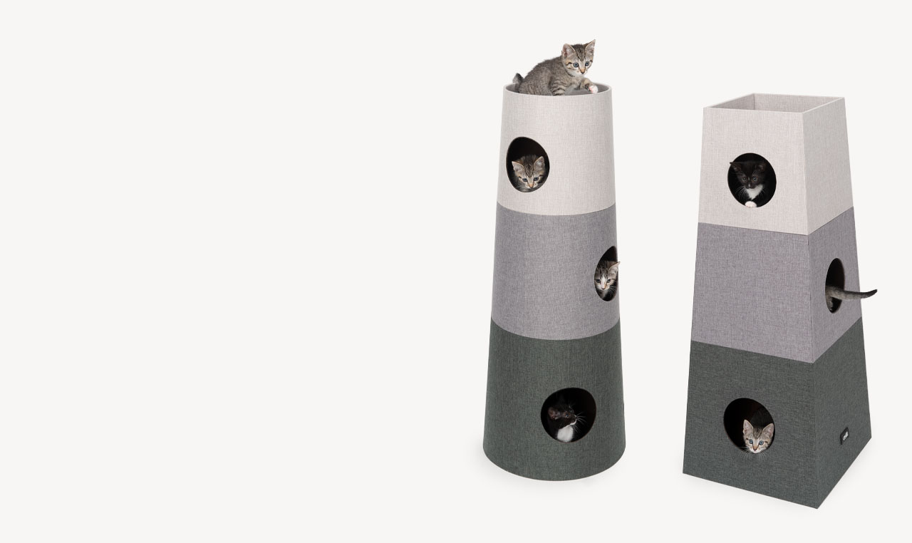 Kitten playing in Vesper Stacking tower round and Vesper Stacking tower square