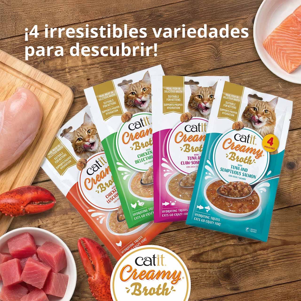 Todos los envases de Catit Creamy Broth en la encimera de madera, con una vista desde arriba de los ingredientes frescos