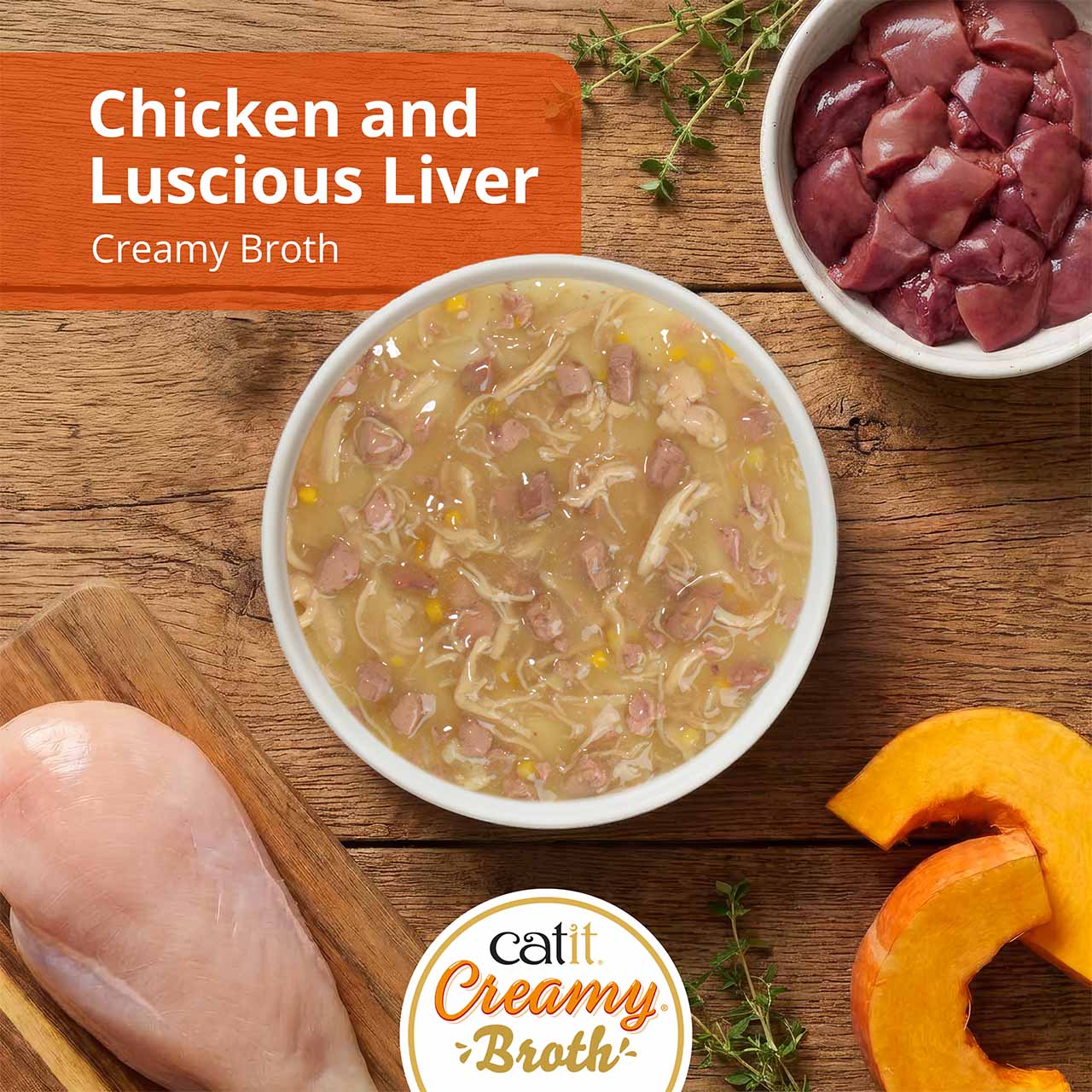 Catit Creamy Broth, chicken & liver on wooden kitchen countertop