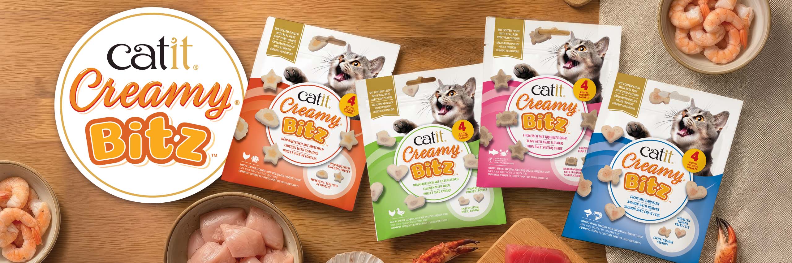 Catit Creamy Bitz cat treats in four flavors: Chicken with Scallops, Chicken with Duck, Tuna, and Salmon with Prawns