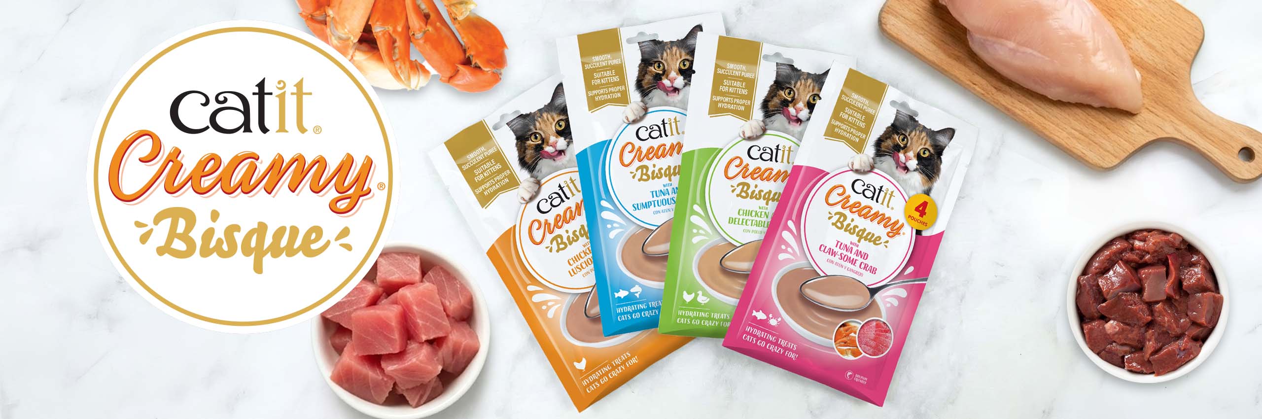 Catit Creamy Bisque cat treat pouches in four flavors: chicken, tuna, chicken and tuna, and tuna and crab