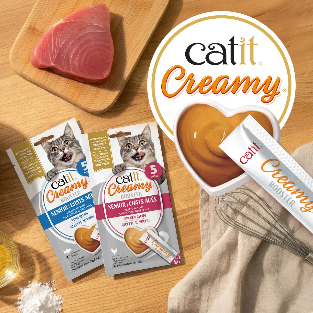Catit Creamy Booster lickable treats for senior cats, available in tuna and chicken flavors